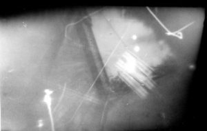 Pinhole image taken by a pinhole camera disguised as a parcel.